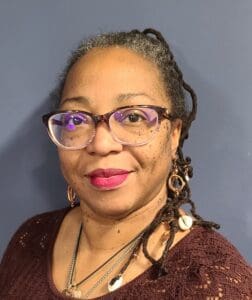 A woman wearing glasses headshot